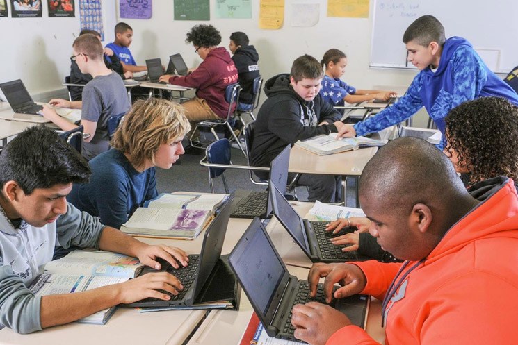 Students studying at Adrian High School.