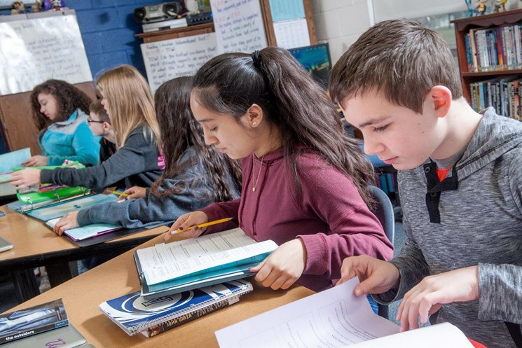 Students studying at their desks.